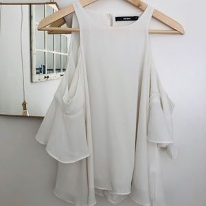 Peep shoulder white blouse